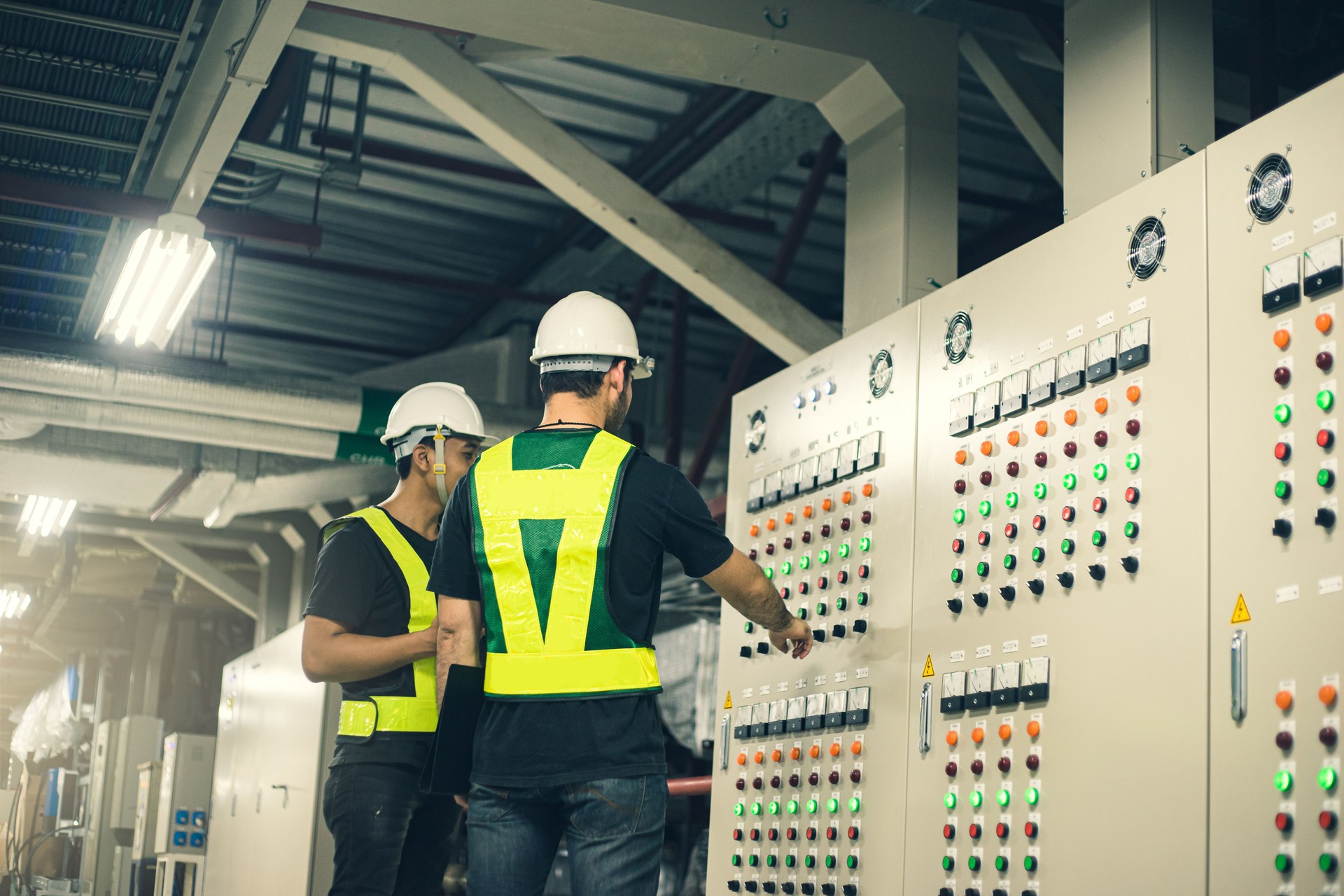 Engineer training job with control panel in service room.